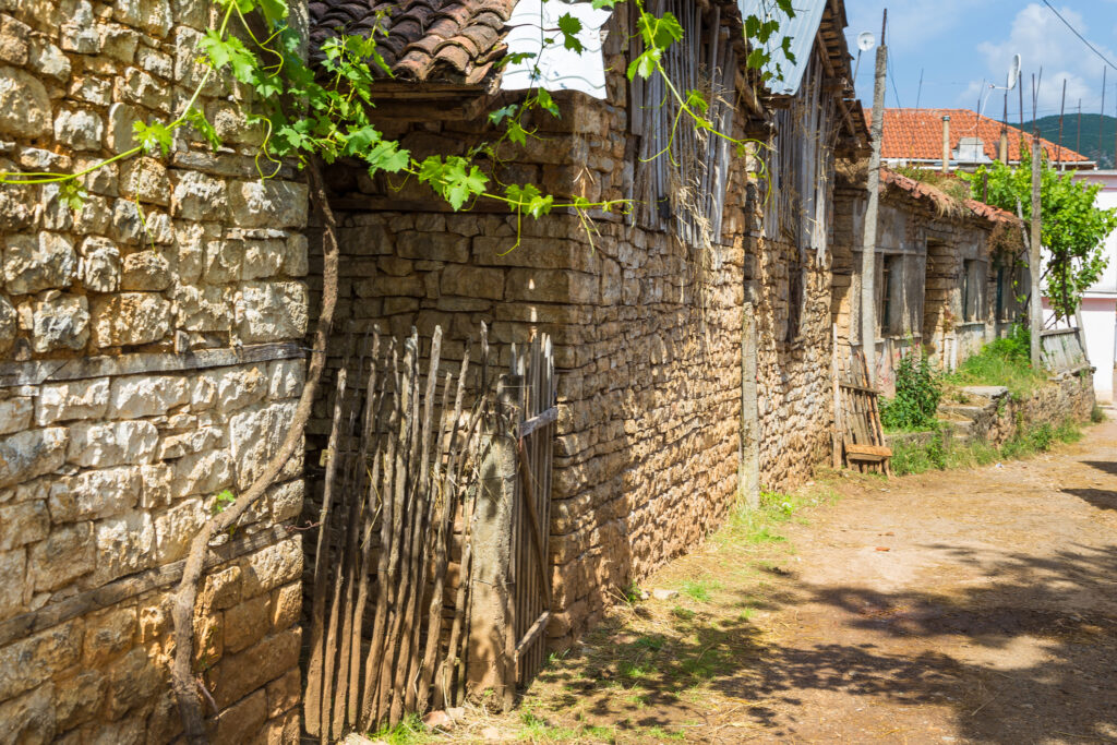 Street of old Lin with archaic, stone buildings, Albania