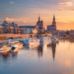 Cityscape image of Dresden, Germany with reflection of the city in the Elbe river, during sunset