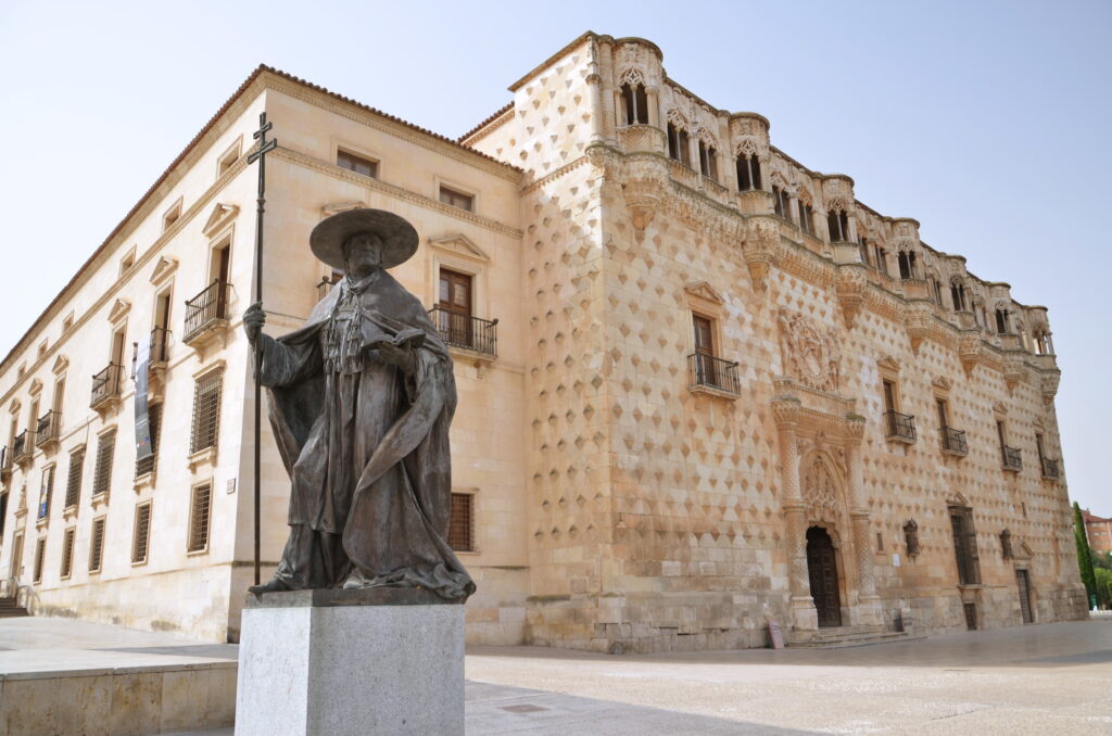 The monument of Don Pedro Mendoza in front of Palace of Dukes of Infantry in Guadalajara, Spain