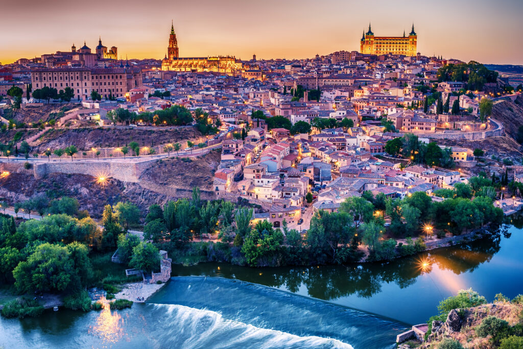 Aerial top view of Toledo, historical capital city of Spain in sunset