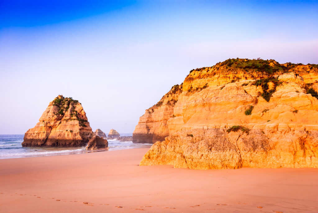 Praia da Rocha, amazing sunrise at Atlantic Ocean, Portimao