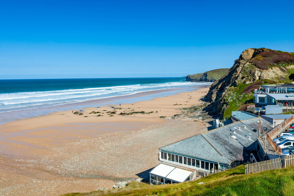 On the coast path overlooking the golden sandy beach at Watergate Bay near Newquay Cornwall England UK