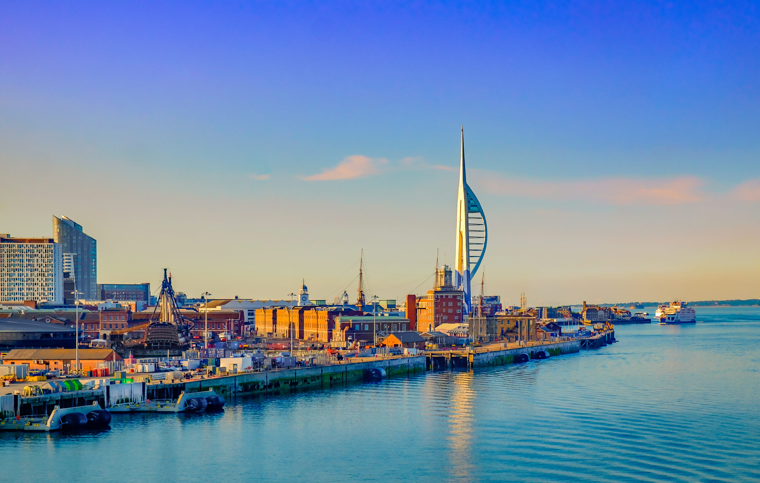 Portsmouth, England, view from a ferry arriving at Portsmouth port in the late evening
