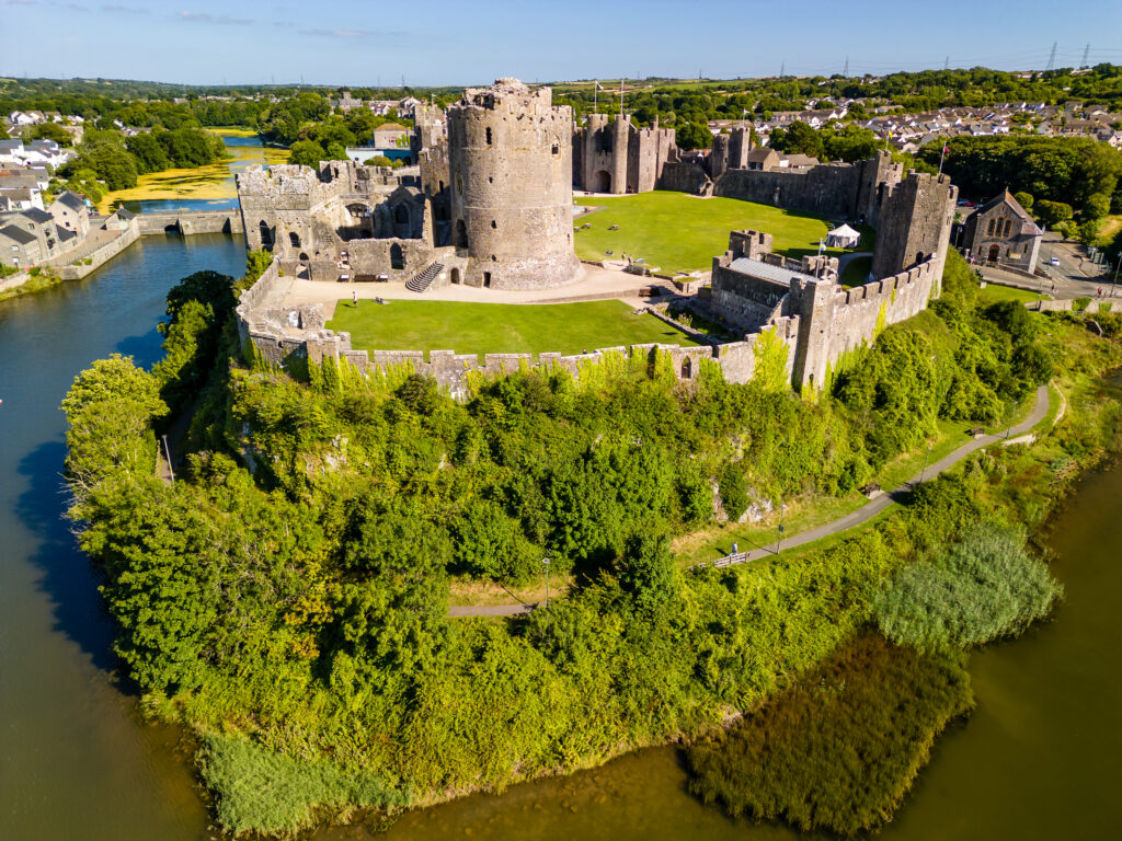 Aerial view of the ruins of historic Pembroke Castle in West Wales, Pembrokeshire
