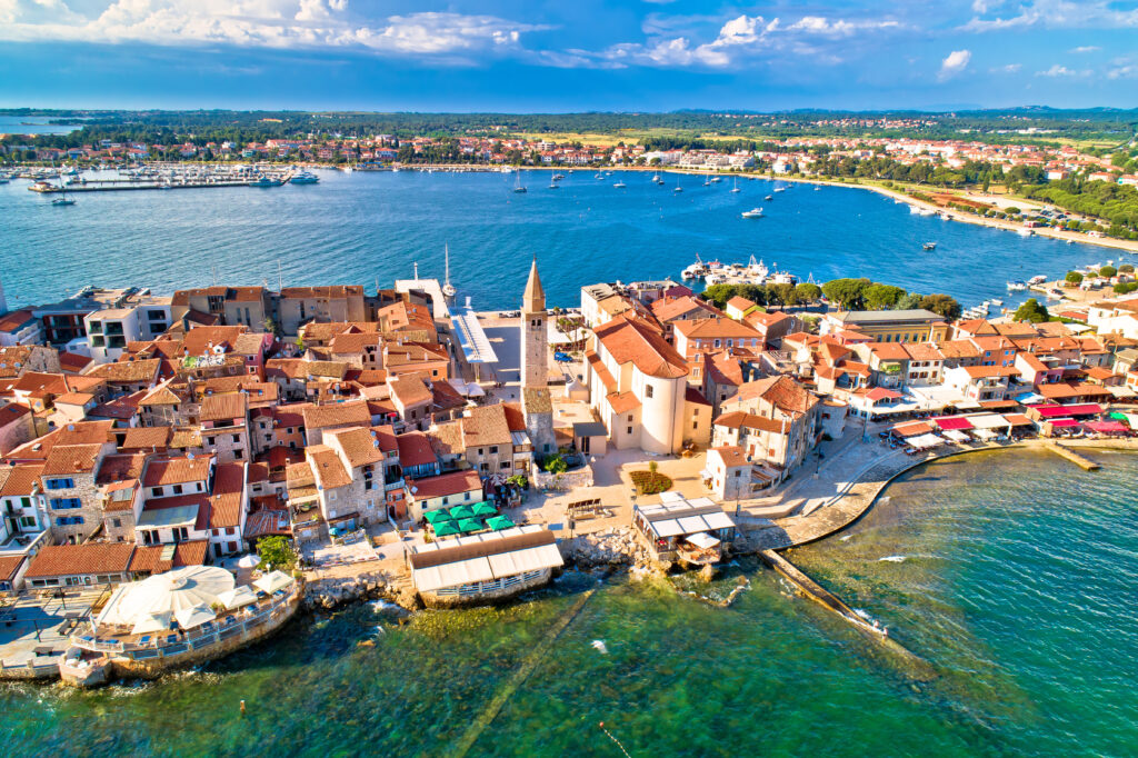 Town of Umag historic coastline architecture aerial view, archipelago of Istria region, Croatia