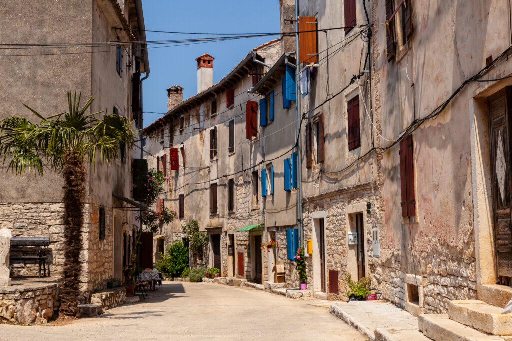 View of typical istrian alley in Valle - Bale. Istria, Croatia
