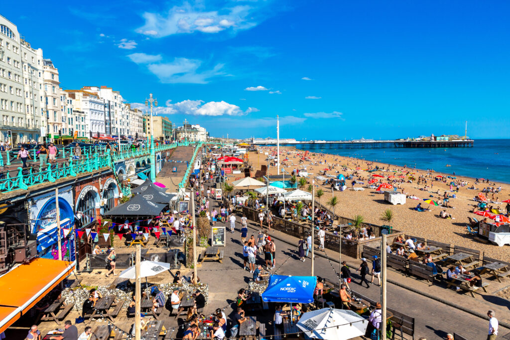 Brighton Pier at Brighton beach in a sunny summer day in Brighton, East Sussex, England, UK
