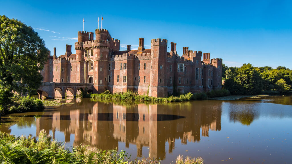 View of a moated brick castle in Southern England