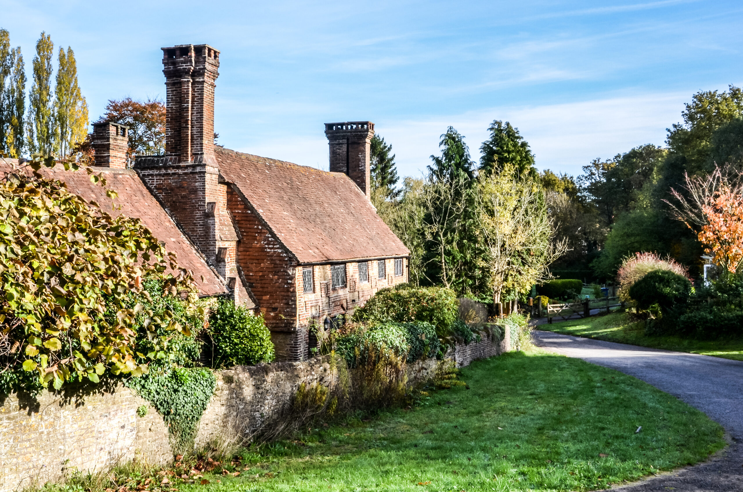 Old cottage with lovely chimneys, Milford Surrey, England, UK