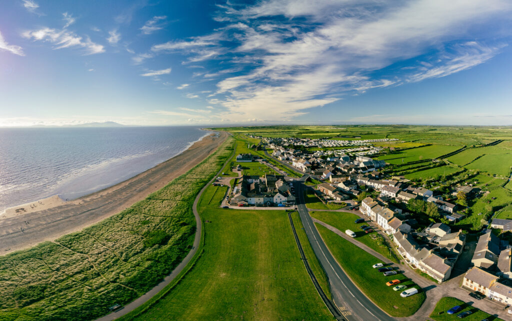 Aerial drone view of Allonby village beach in Allerdale district in Cumbria, UK