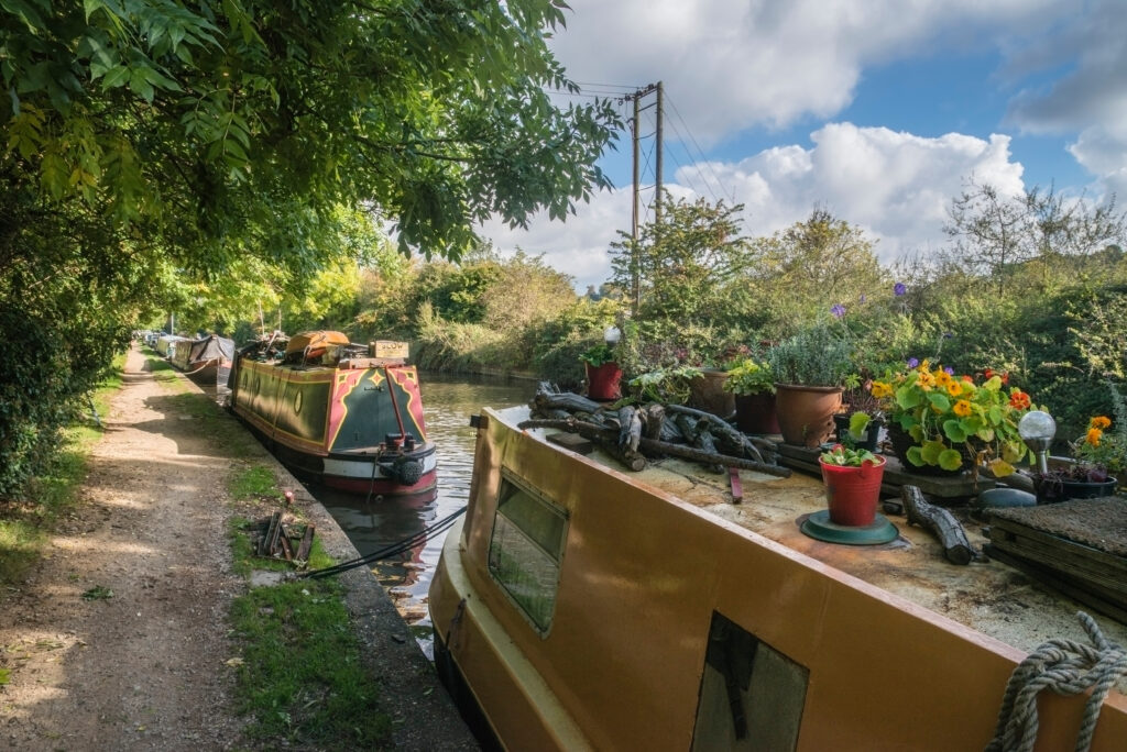 MIDDLESEX, UK: Canal barges on Grand Union Canal at Rickmansworth in Colne Valley Regional Park