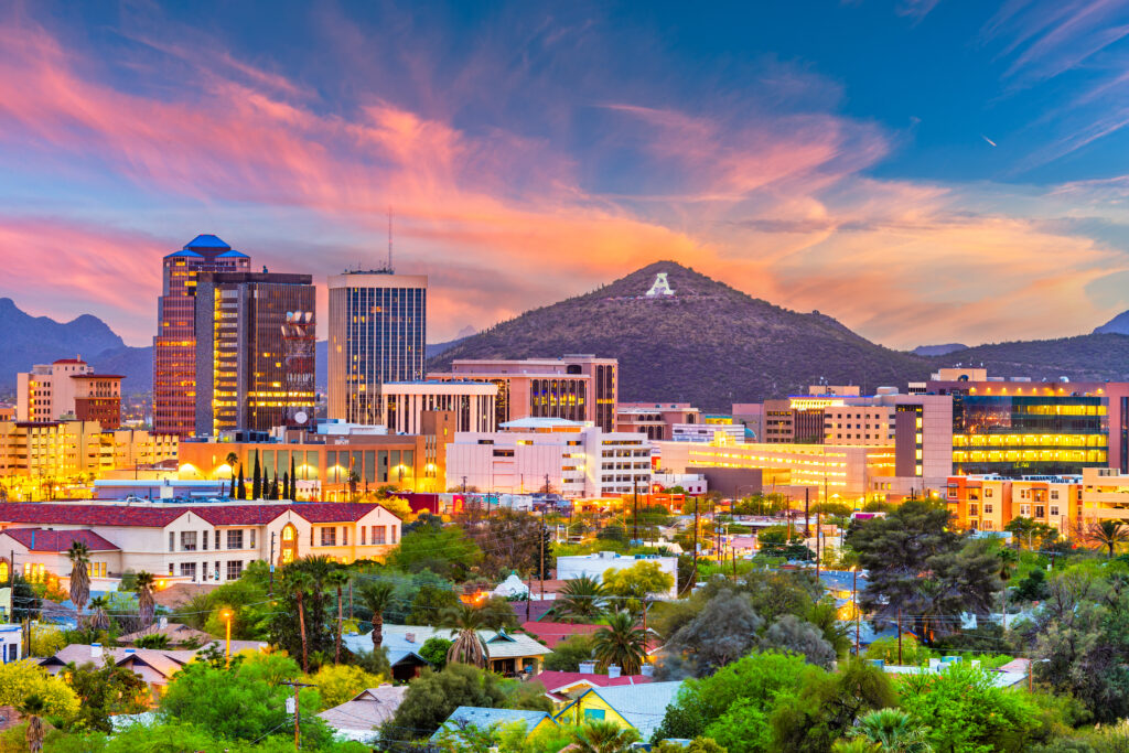 Tucson, Arizona, USA downtown skyline with Sentinel Peak at dusk