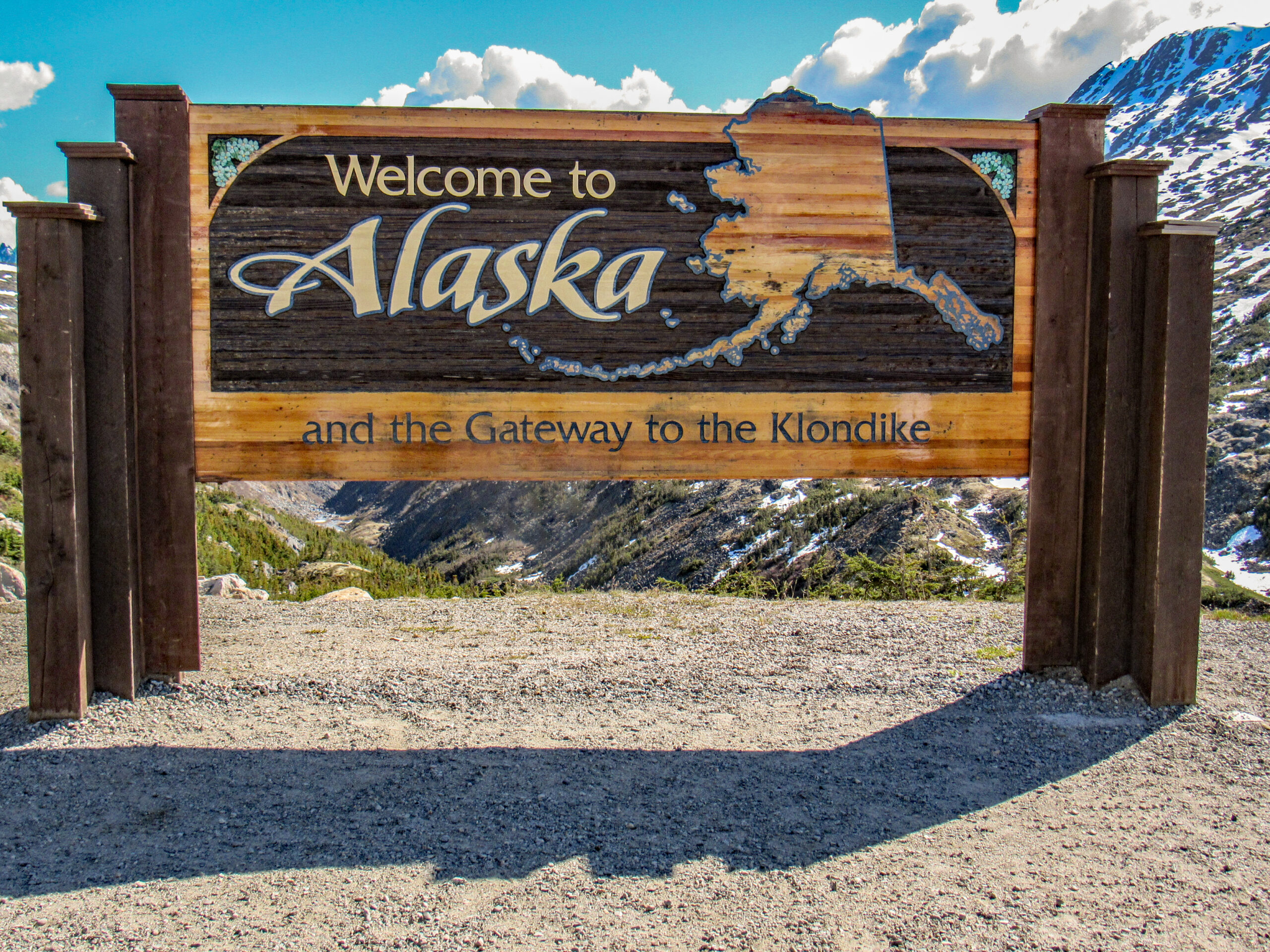 The Welcome to Alaska and the Gateway to the Klondike sign