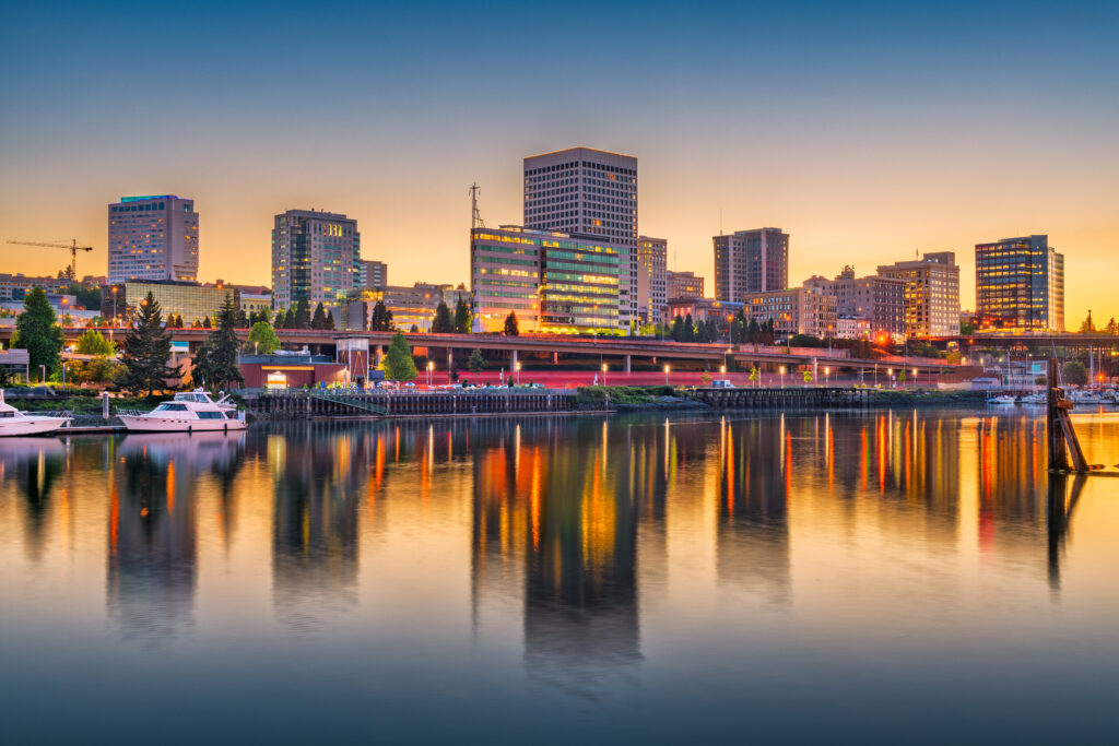 Tacoma, Washington, USA downtown skyline at dusk on Commencement Bay.