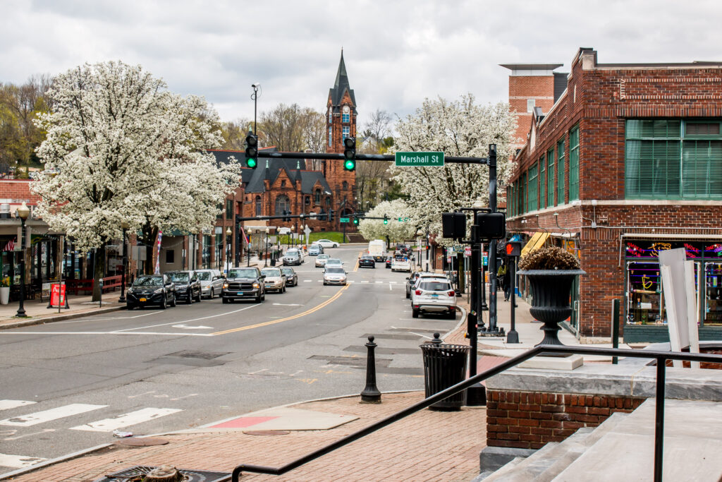 NORWALK, CT,USA: View from North Main Street in spring day with blooming trees