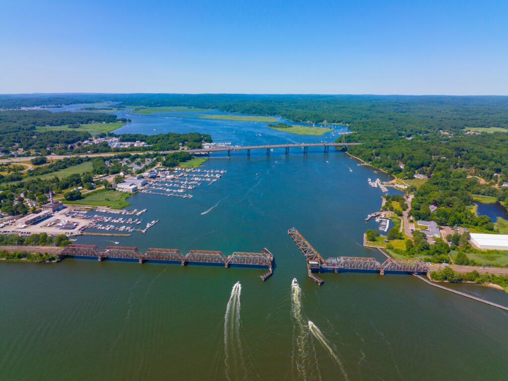 Old Saybrook Old Lyme Bridge (train) and Raymond E. Baldwin Bridge (vehicle on Interstate Highway 95) at the mouth between town of Old Saybrook and Old Lyme, Connecticut CT, USA.