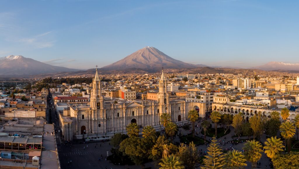 Arequipa, Peru: Panoramic view of the Basilica Cathedral of Arequipa and the Plaza de Armas in the colonial old town in Peru at sunset