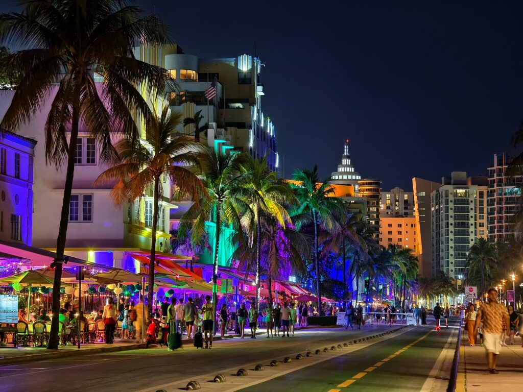 Miami Beach, Florida: Nightlife scene on Ocean Drive in South Beach, filled with al fresco restaurants and art deco buildings.