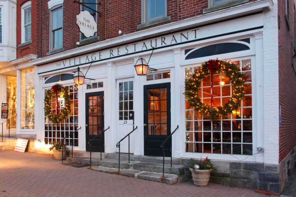 Litchfield, CT, USA: The Village Restaurant front in the evening with Christmas decorations.