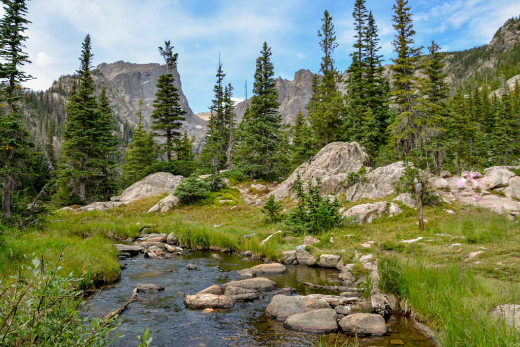 Tyndall creek crossing Emerald Lake trail with Hallett peak in the background
Rocky Mountain National Park, Estes Park, Colorado, United States
