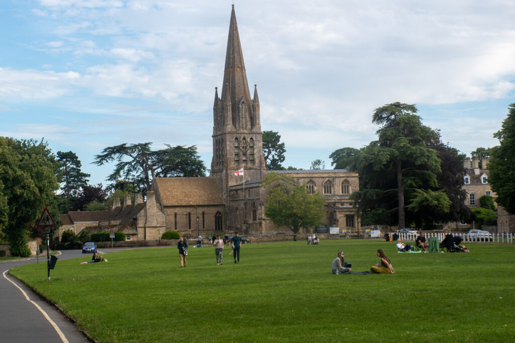 Witney Oxfordshire Uk: Witney St Mary's Church with Green in foreground