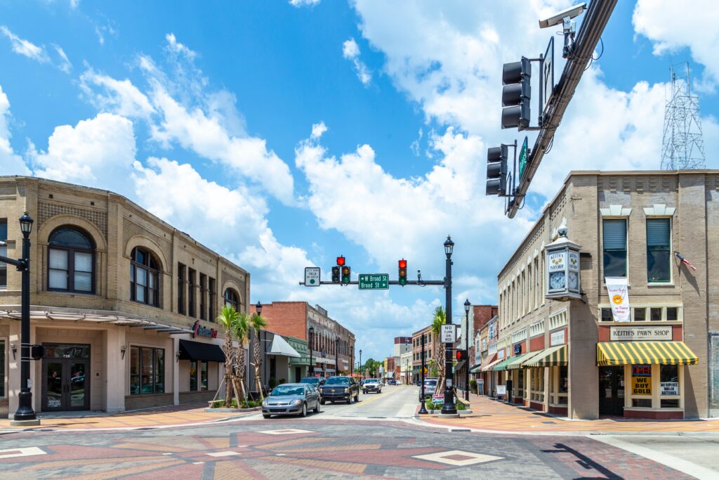 Main street in historic Lake Charles old town in Midday sun.
