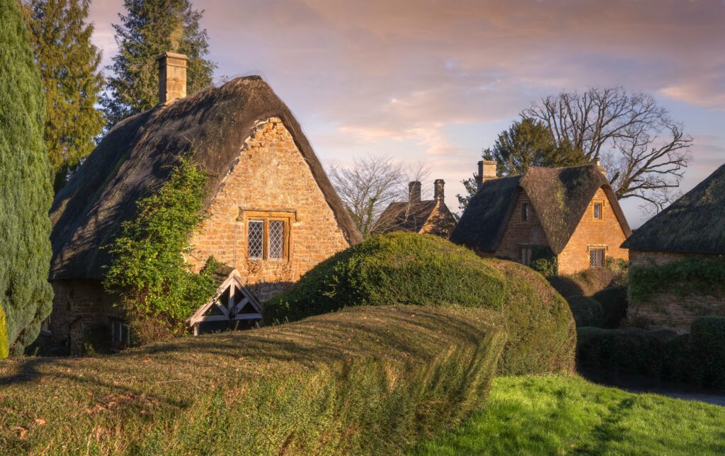 Cotswold cottages at Great Tew, Oxfordshire, England.