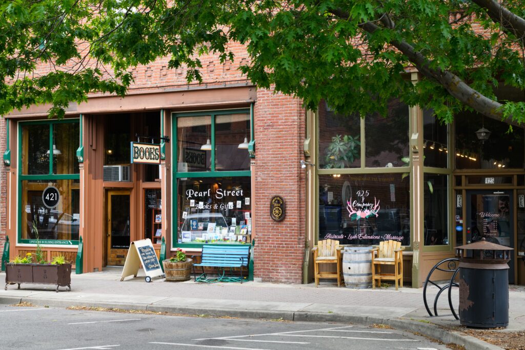 Ellensburg, WA, USA; Businesses in the historic Lynch Block of downtown Ellensburg Washington with a bookshop and a full service salon