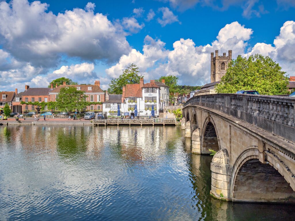 Henley on Thames, UK - Henley Bridge and the River Thames, with The Angel riverside pub and restaurant.