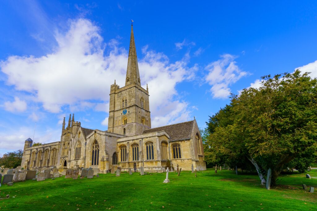 View of St. John the Baptist church, in Burford, the Cotswolds region, England, UK
