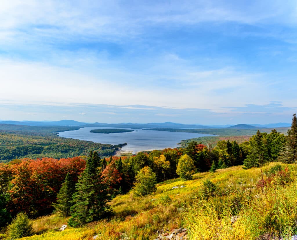 Panoramic View of the Landscape View of Lake Rangeley Maine with Fall Autumn Trees Turning Colors