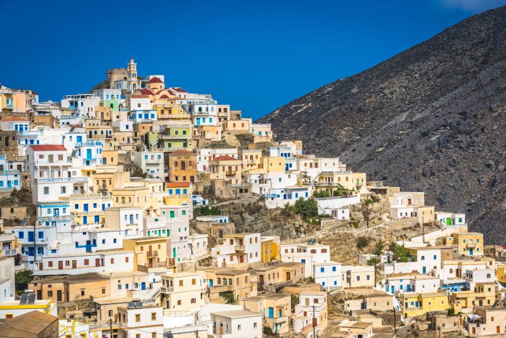Hillside colorful homes in the old tradition village Olympos in Karpathos island, Dodecanese Greece