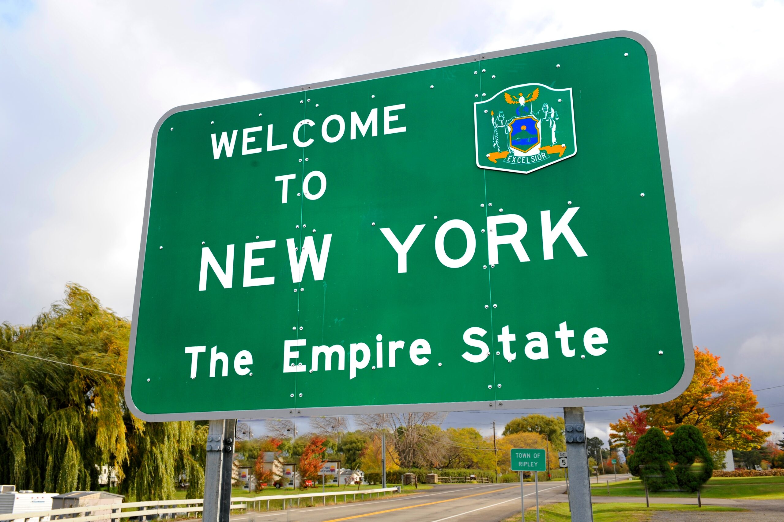 Welcome to New York State Empire State sign along highway