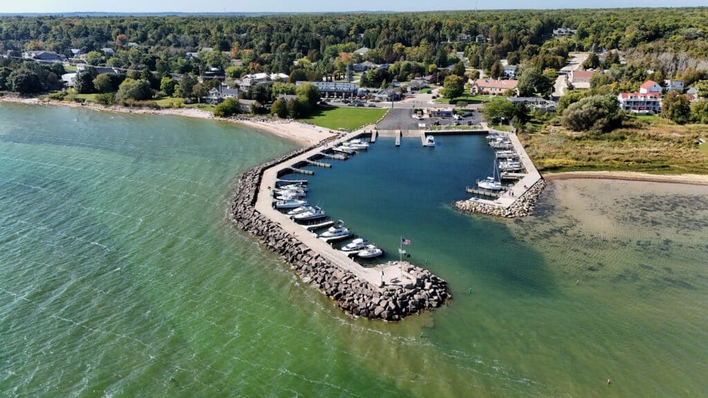 Aerial of Bailey's Harbor Door County Wisconsin Lake Michigan coastline on a bright sunny day