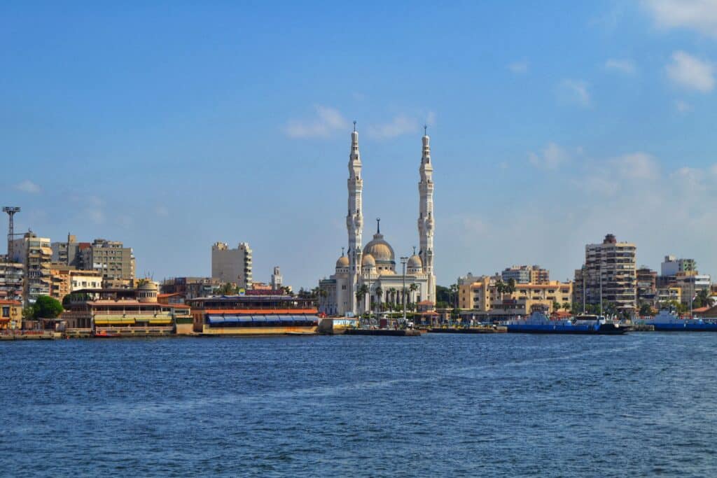 Suez Canal ships and cranes in Port Said