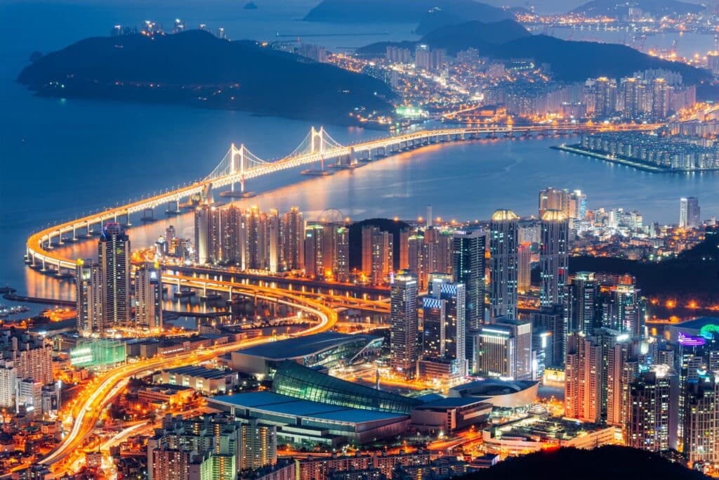 Busan, South Korea aerial skyline view at night.