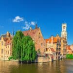 Bruges cityscape, Brugge old town scenic view quarter historical city centre, Rosary Quay Rozenhoedkaai embankment, Belfort Belfry tower, Dijver water canal of Reie river, Flemish Region, Belgium