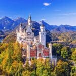 Neuschwanstein Castle (Schloss Neuschwanstein) Bavaria. Fussen, Germany. Front view of the castle. The Bavarian Alps in the background.