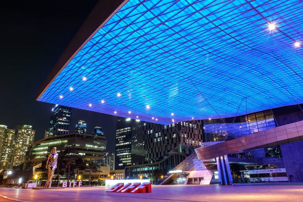 Songdo cable car and curved skywalk over the ocean in Busan at sunset