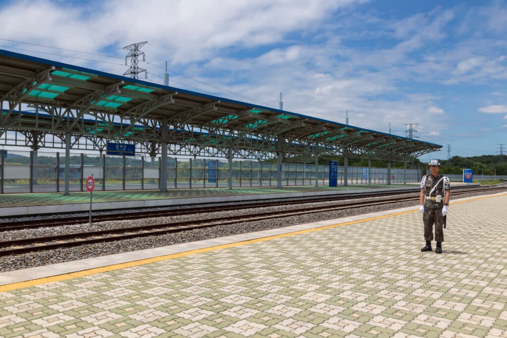 Dorasan train station platform near Korean Demilitarized Zone with soldier