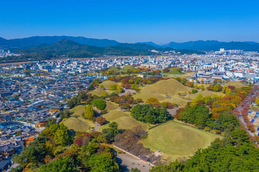 Ancient burial mounds in Gyeongju surrounded by city landscape South Korea