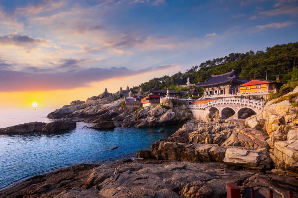 Haedong Yonggungsa Temple on the coast in Busan South Korea at sunset