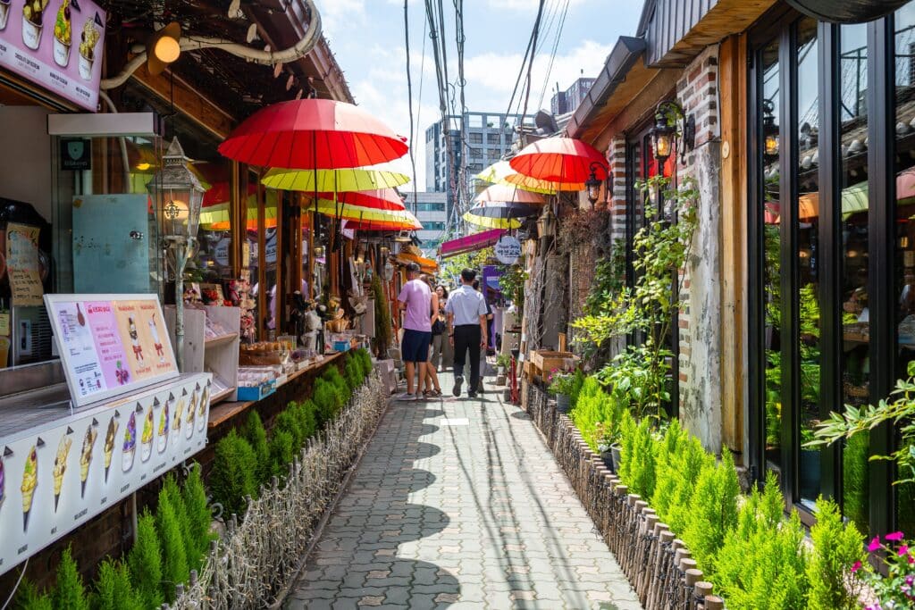 Colorful alley in Ikseon-dong Seoul with cafés and shops
