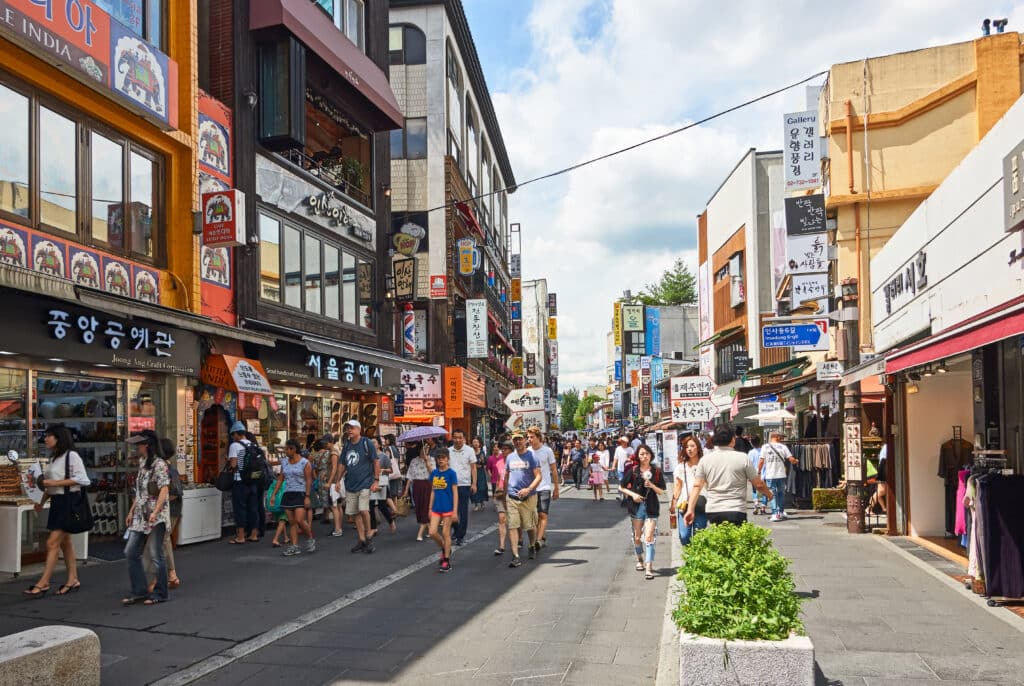 Crowded street in Insadong Seoul with shops, galleries, and traditional stores