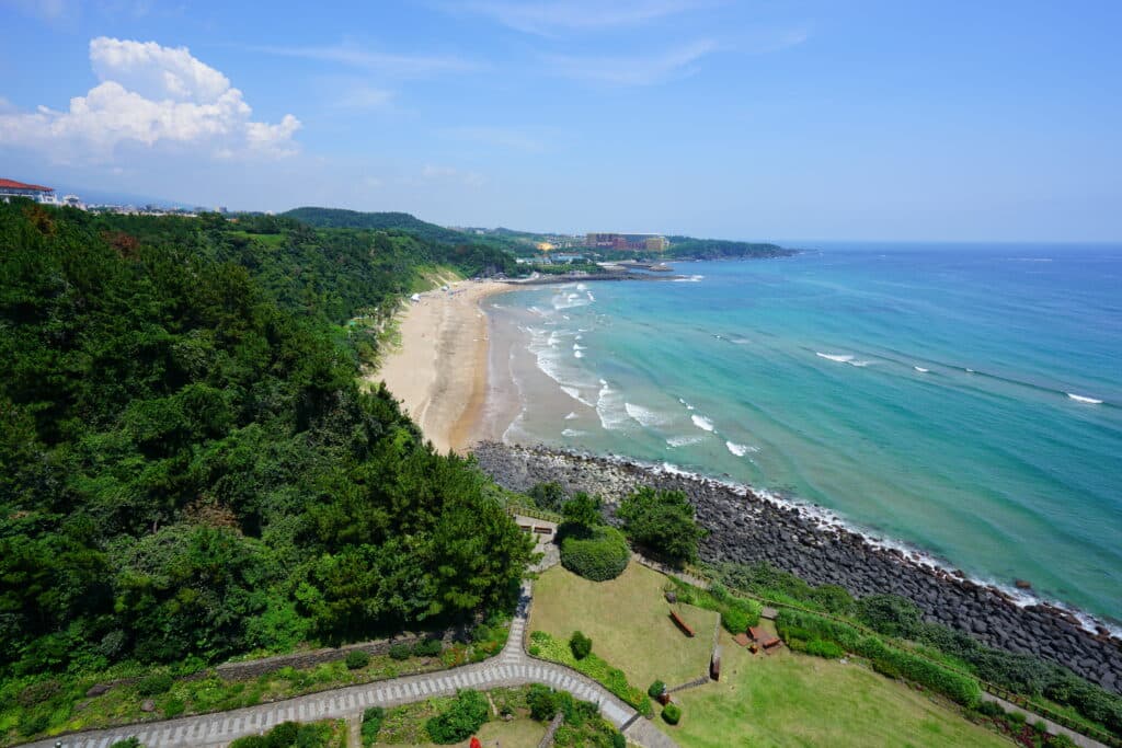 Jungmun Saekdal Beach coastline with volcanic rocks on Jeju Island