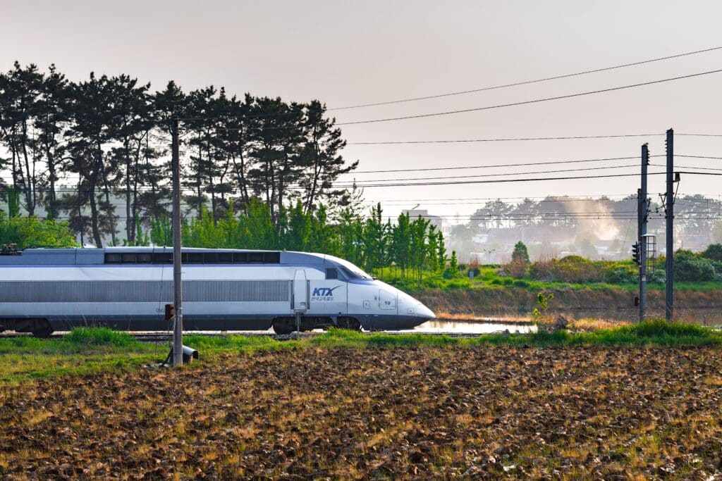 KTX high-speed train traveling through the Korean countryside