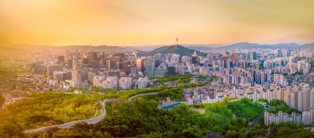 Seoul skyline at golden hour with N Seoul Tower in the distance