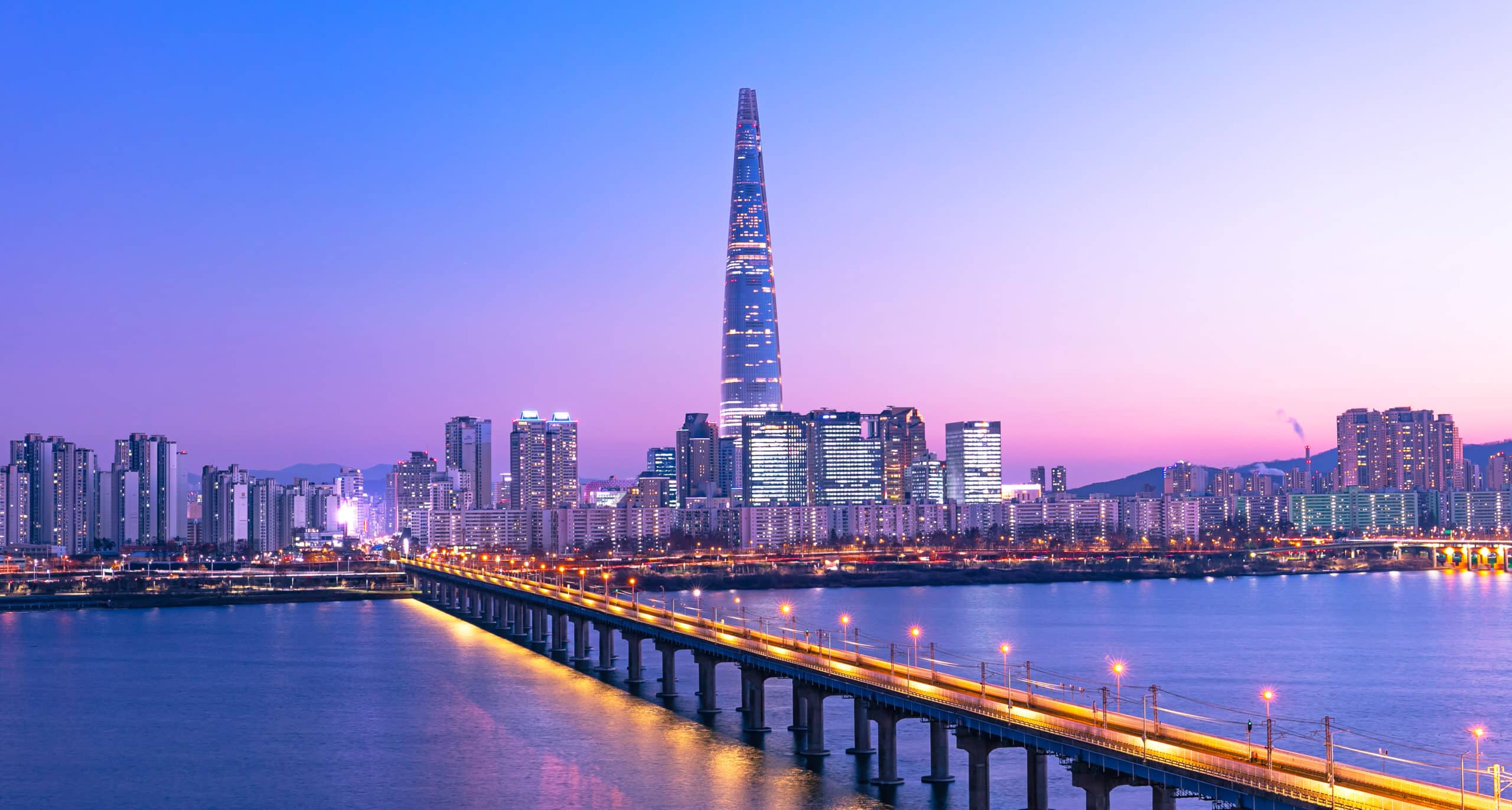 Seoul skyline with Lotte World Tower and Han River at sunset
