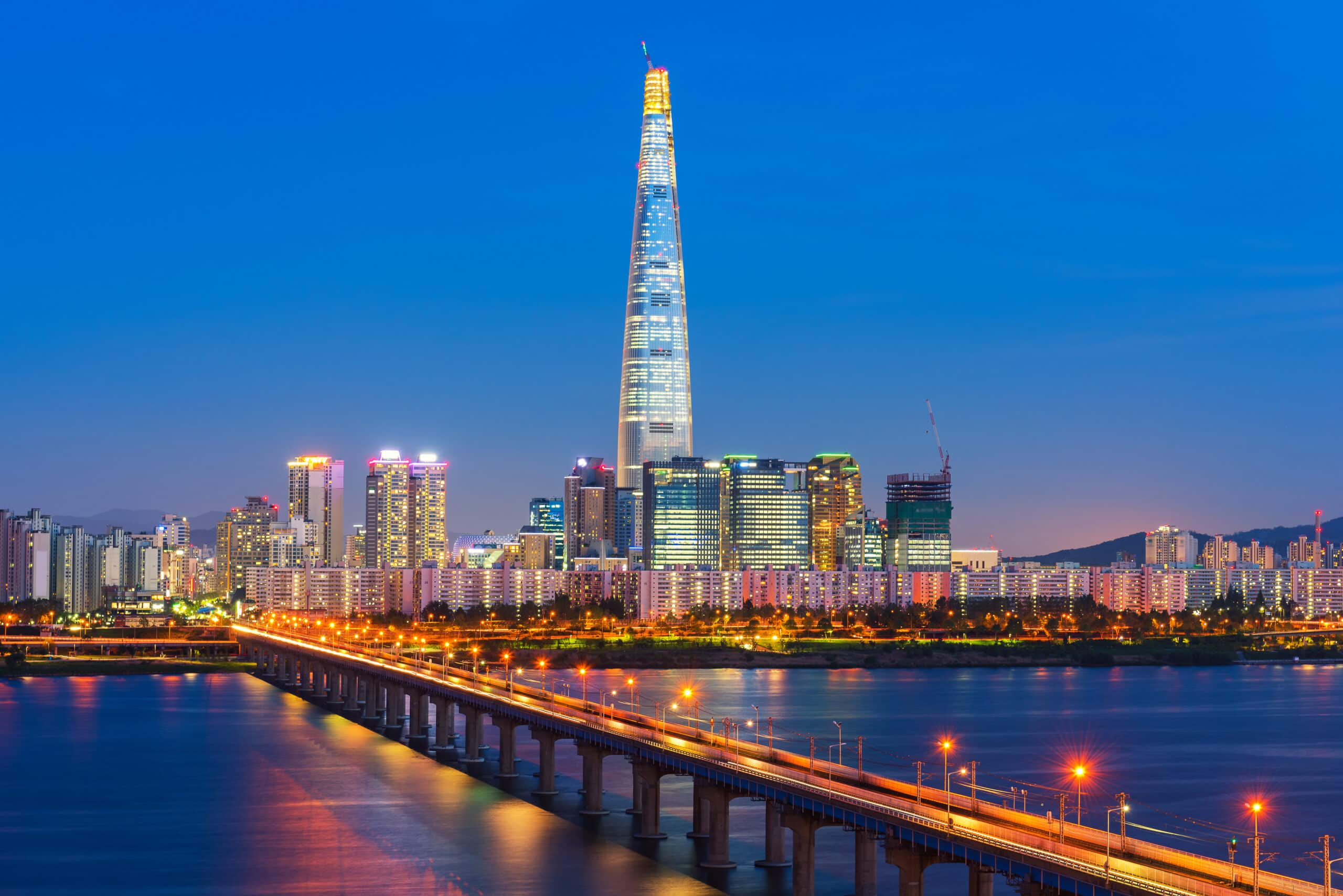 Seoul skyline at night with Lotte World Tower and illuminated cityscape
