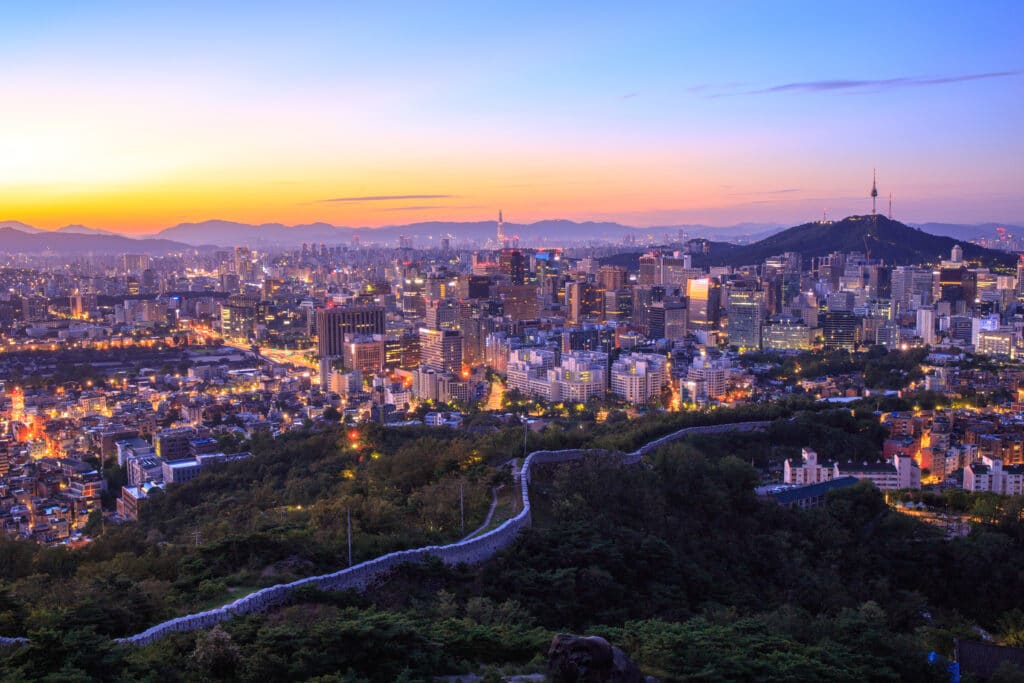 Seoul skyline at sunset with N Seoul Tower on Namsan Mountain